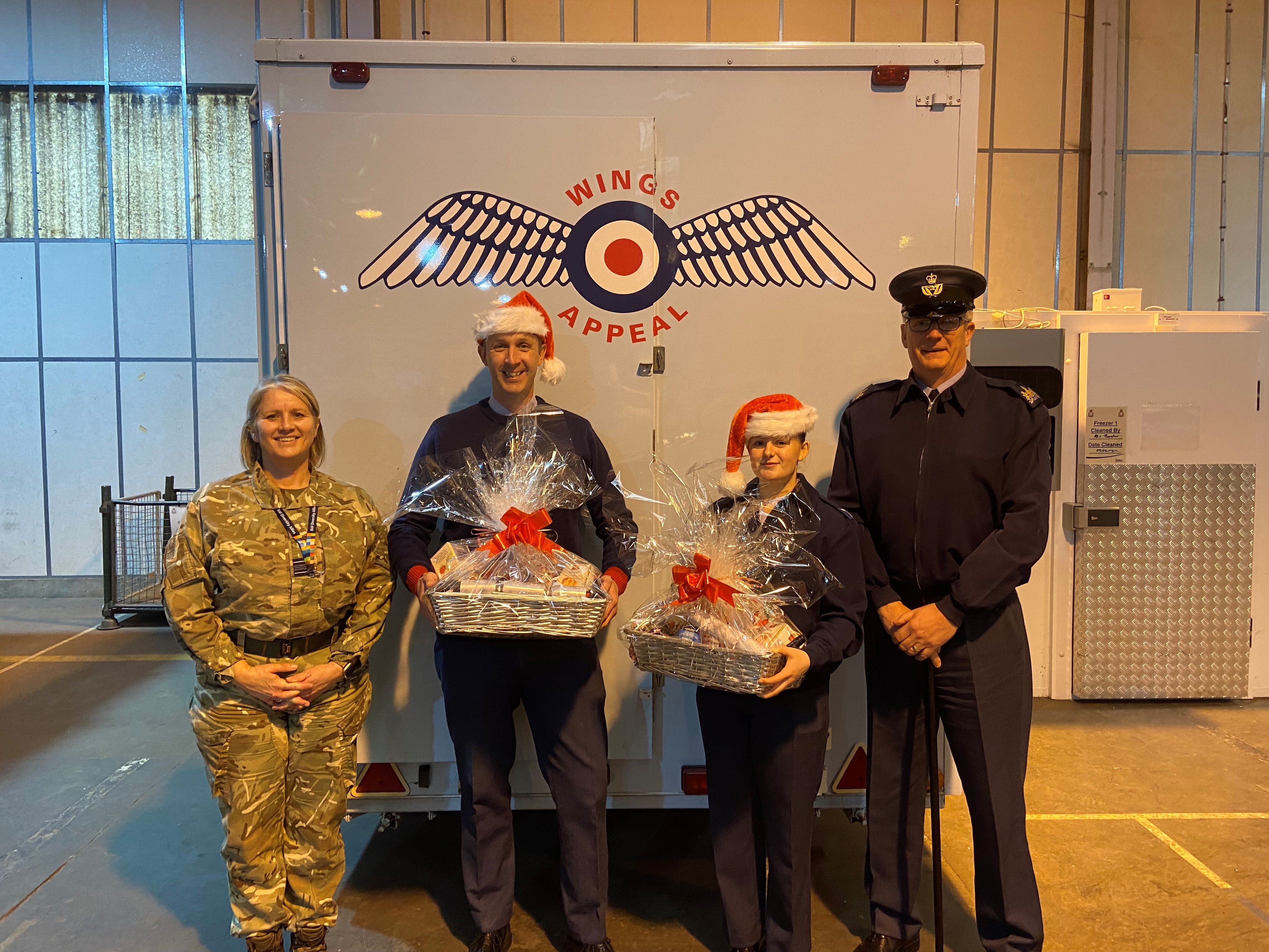 From Left: OC 3MCS & RAFA Wittering & District Branch Chair Sqn Ldr Sara Jones, RAF Wittering Station Commander Wg Cdr Jez Case, AS1 Annie Nicol and Station Warrant Officer WO Darren Rose